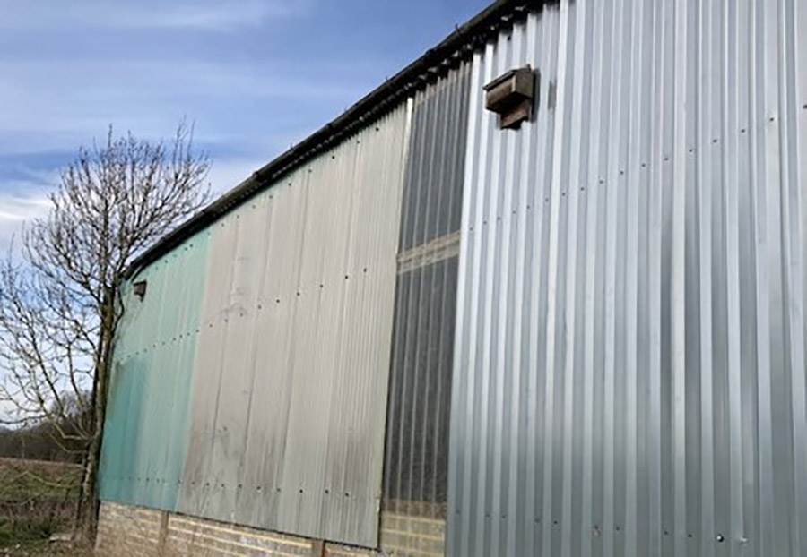 Two of the installed bat boxes on the south-west side of the agricultural barn