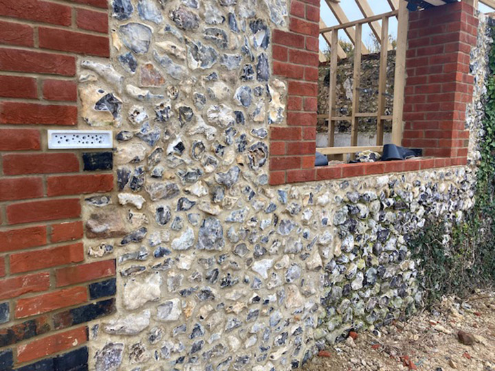 Bee brick in the south-easter wall of the building